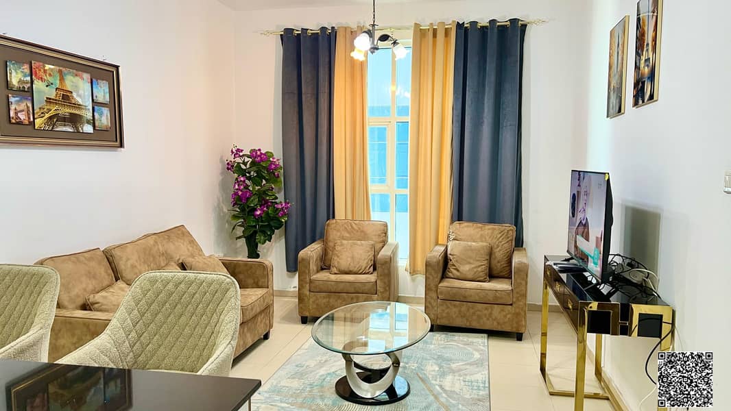 For sale: One-bedroom apartment in Ajman, ready for occupancy or investment. Immediate handover with private parking inside the towers