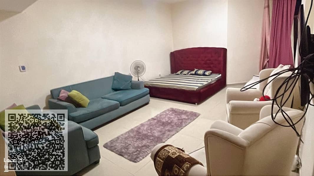 Studio apartment in Al Hawaizone Towers for sale in Al Rashidiya 1, Ajman, near Ajman Cooperative Society