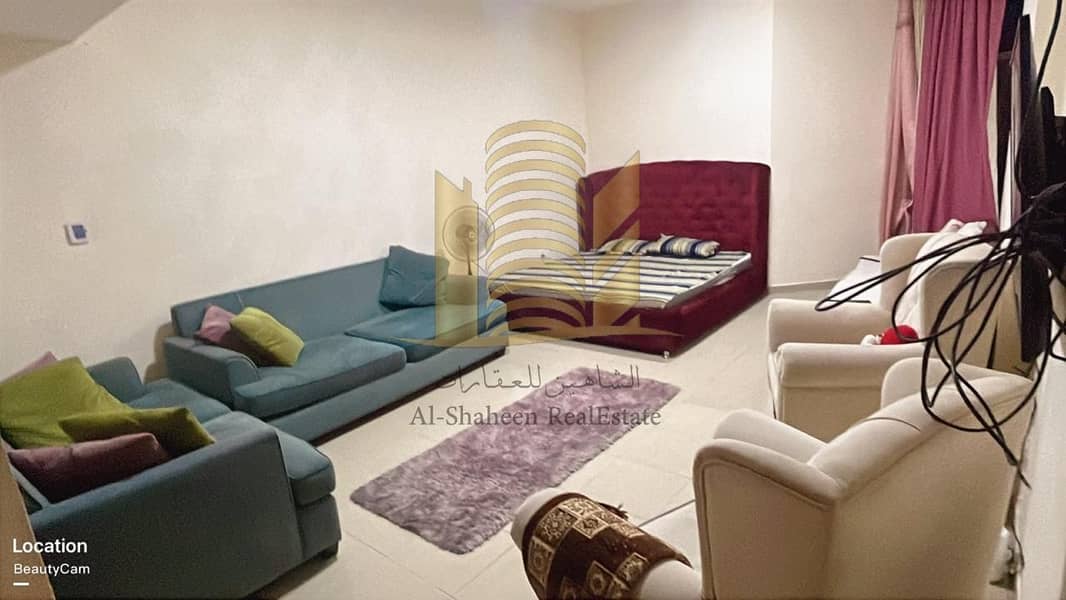Studio apartment for sale in Al Hawairzone Towers, Al Rashidiya 1, near Ajman Cooperative Society