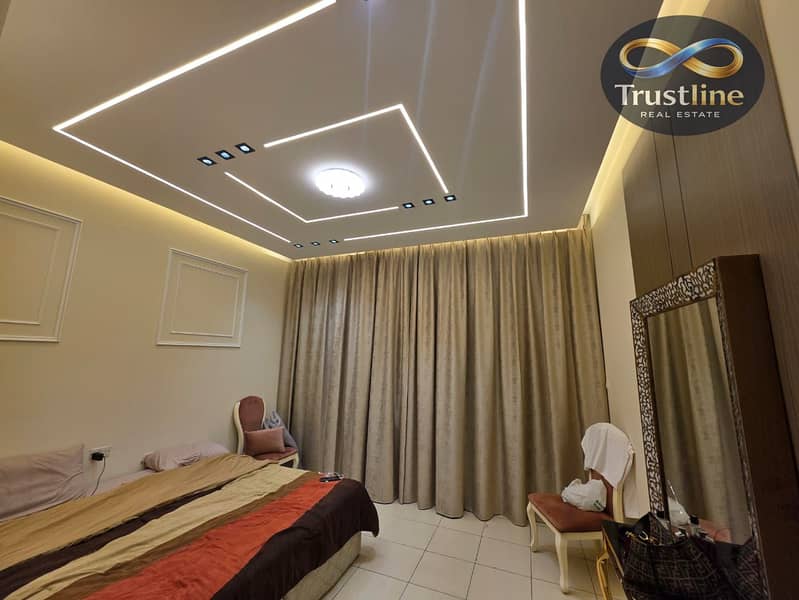 A unique opportunity to own a spacious two-bedroom apartment for sale in Ajman One Tower with a beautiful view of the city and the park, within one of