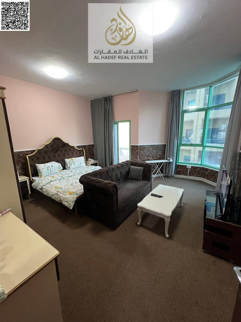 A prime opportunity for sale in Ajman — a two-bedroom apartment with a lake view in Al Khor Towers. This spacious apartment features brand new finish