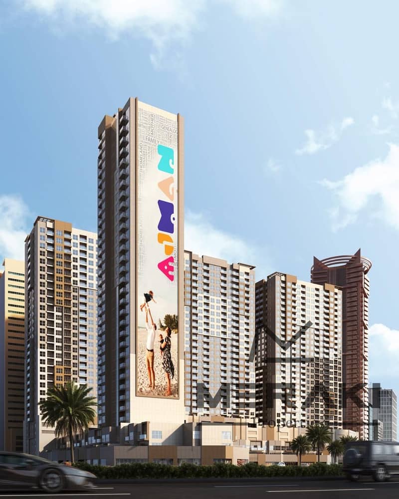 A studio apartment at a special price in Ajman, One Face Two with a balcony, open view, parking, and also an excellent installment plan.