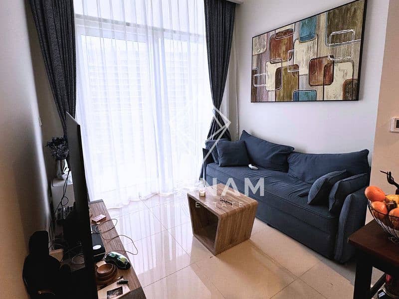 Stunning High-Floor 1BR | Burj View | Rented | Prime Investment