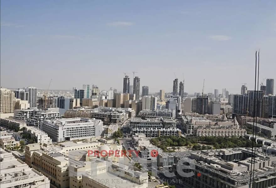 High-Floor Studio | Binghatti Apex JVC | Balcony & Corner City View
