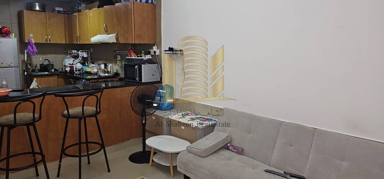 Studio apartment for sale in Al Nuaimiya Towers, Tower C, with parking space.