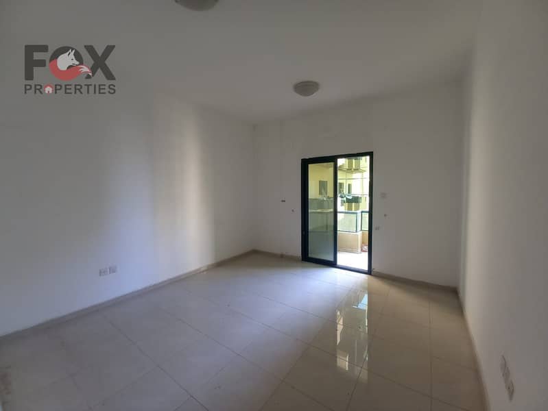 Two bedrooms and a living room with an open view for sale in Al Rashidiya Towers at a bargain price for a quick sale
