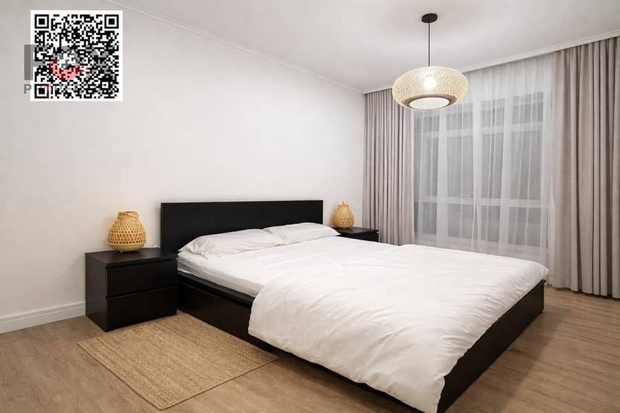 A great deal on a 1029 sq ft two-bedroom apartment with a living room, fully furnished and with parking, in Garden City, Ajman - AED 500,000 cash