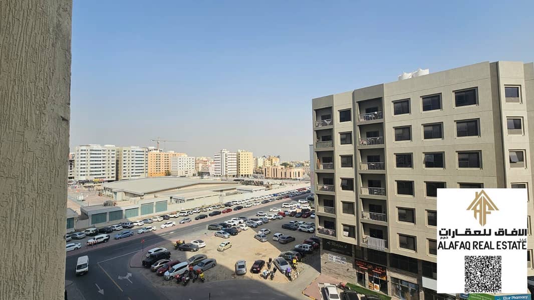 Two-Bedroom Apartment with Living Room for Sale in Garden City Towers, Ajman, with Private Parking. Area 1,142 sq. ft. – Price: AED 420,000. Great Opp