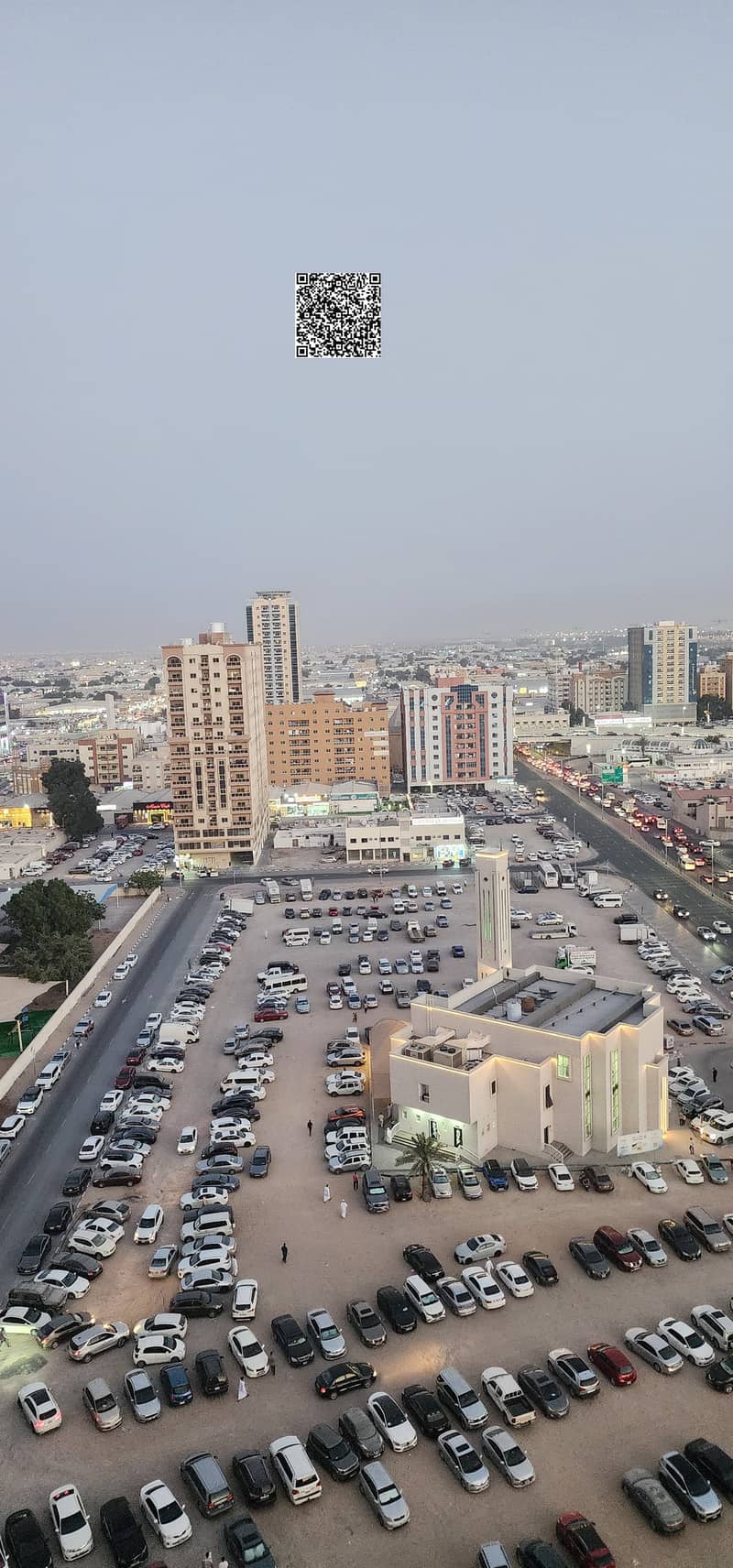 For sale in Ajman, an apartment in Al Nuaimiya Towers, Tower One. Area: 980 sq ft - Open view overlooking Kuwait Street.