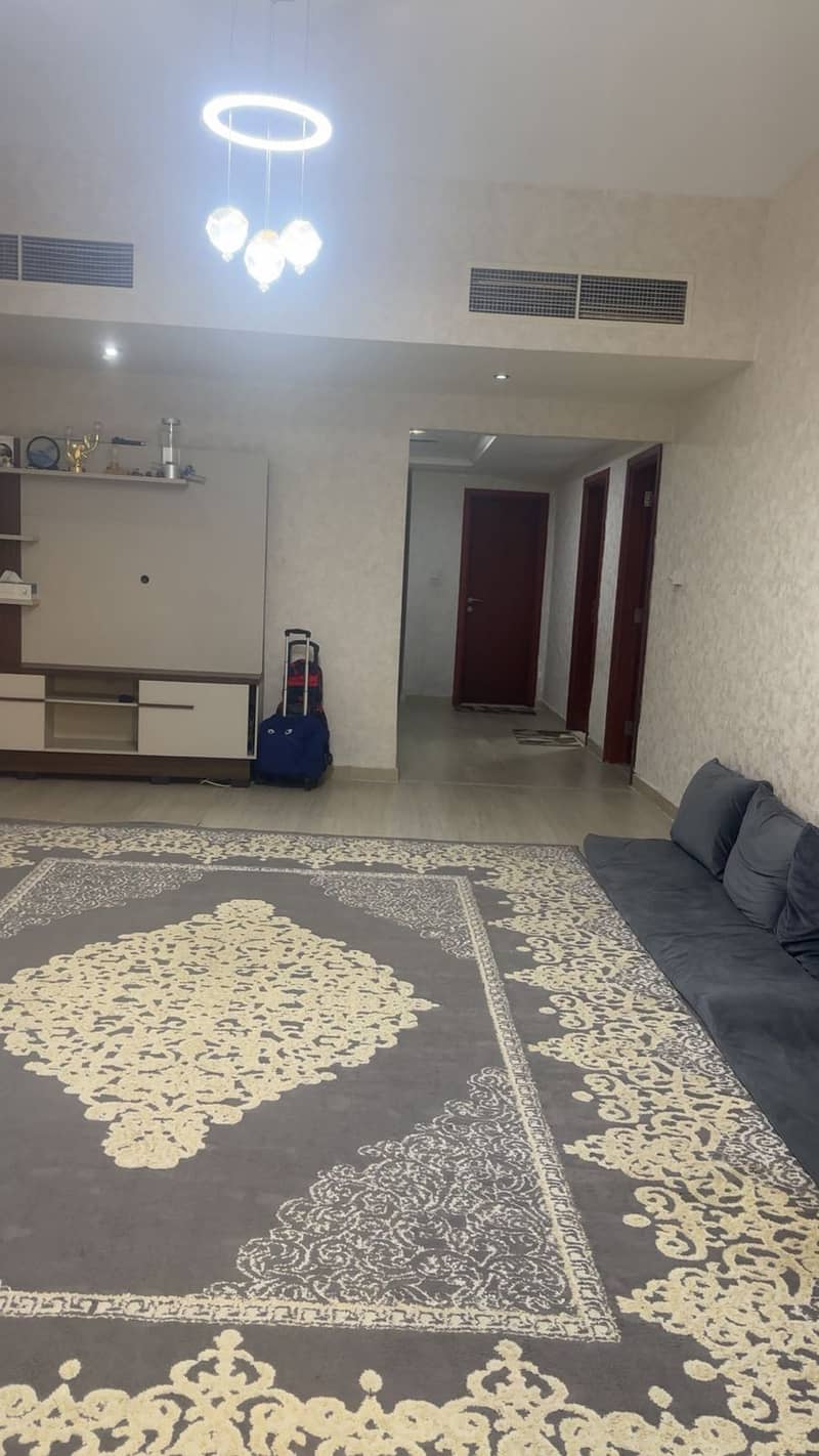 Spacious 1-bedroom apartment for sale in Horizon Towers, Rashidiya 1, Ajman. Prime location close to malls, schools, restaurants, and hospitals, with