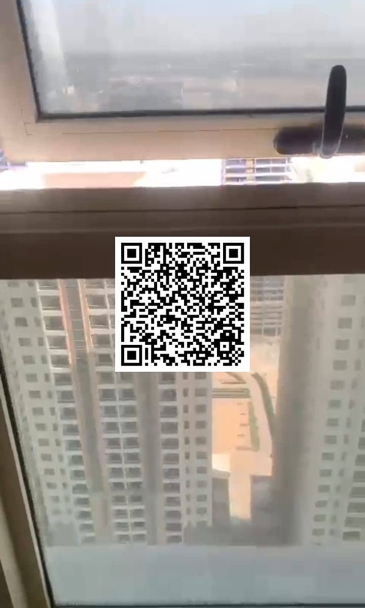 2-Bedroom Apartment with Living Room for Sale in Lilies Tower, Emirates City Ajman – Prime Location with Guaranteed Rental Income