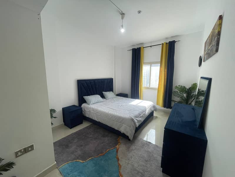 Apartment for sale – Al Taawun Al Kinana | Sharjah. Two bedrooms, living room, two bathrooms, small balcony. Area: 90 sq m. No parking. Centr