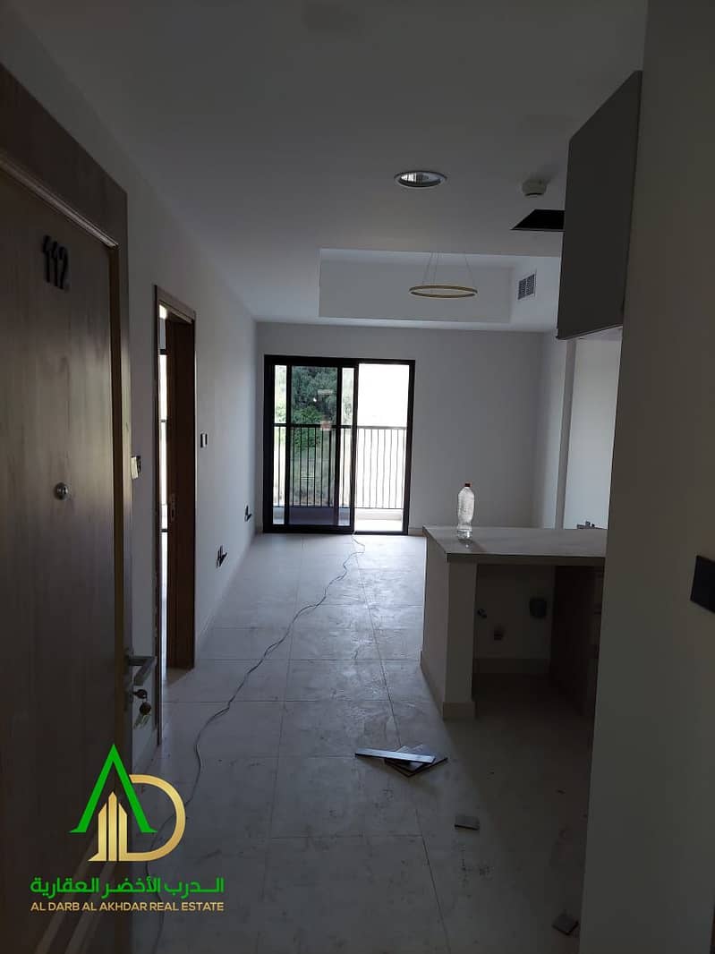 Own a two-bedroom apartment with a living room in the Emirate of Ajman in Al Zahya area at the Kentia Project, located directly near Sheikh Mohammed b