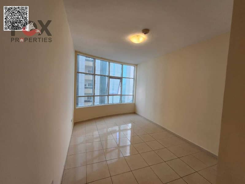 Two bedrooms and a living room for sale with a down payment of 157,000 dirhams in the Orient Towers, Ajman. A great deal with monthly installments of