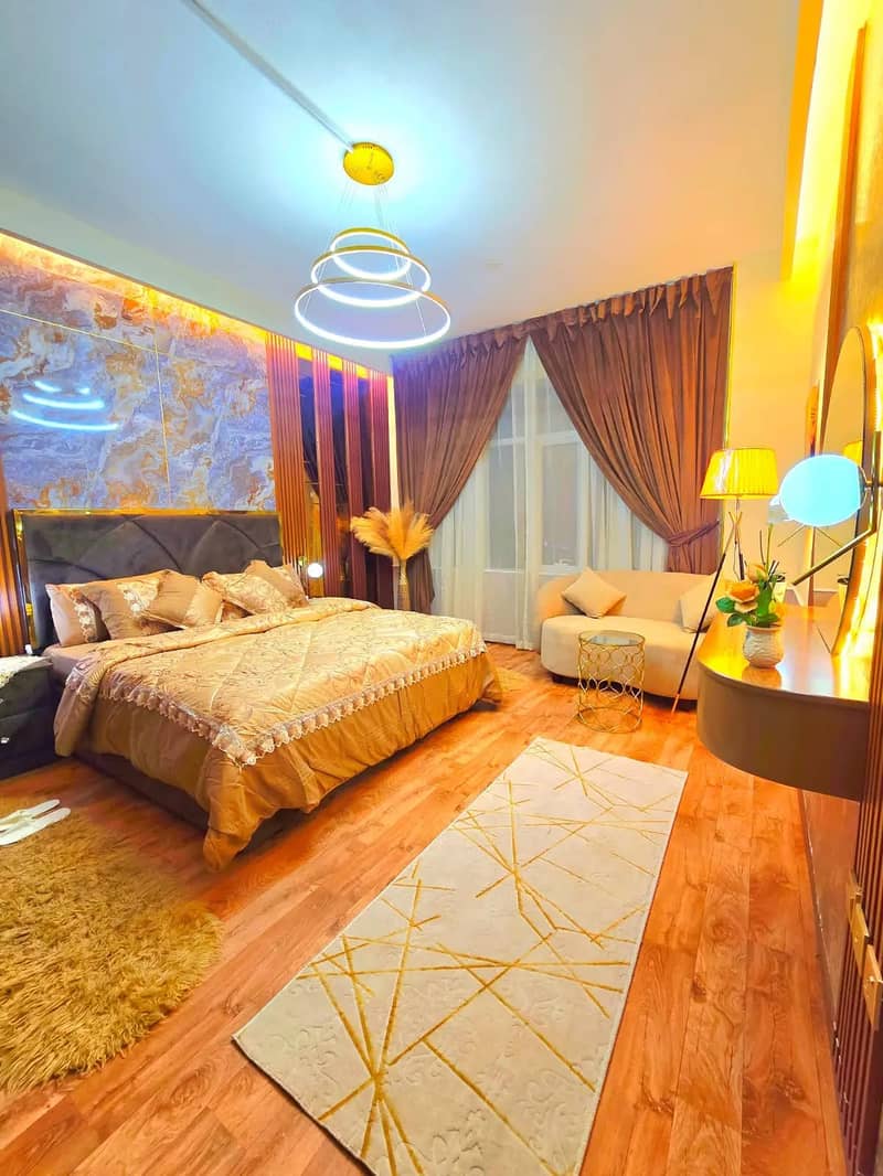 Furnished 2BR apartment for sale with sea view in Horizon Towers, Al Rashidiya, Ajman, near Safeer Mall and Sheikh Khalifa Street.