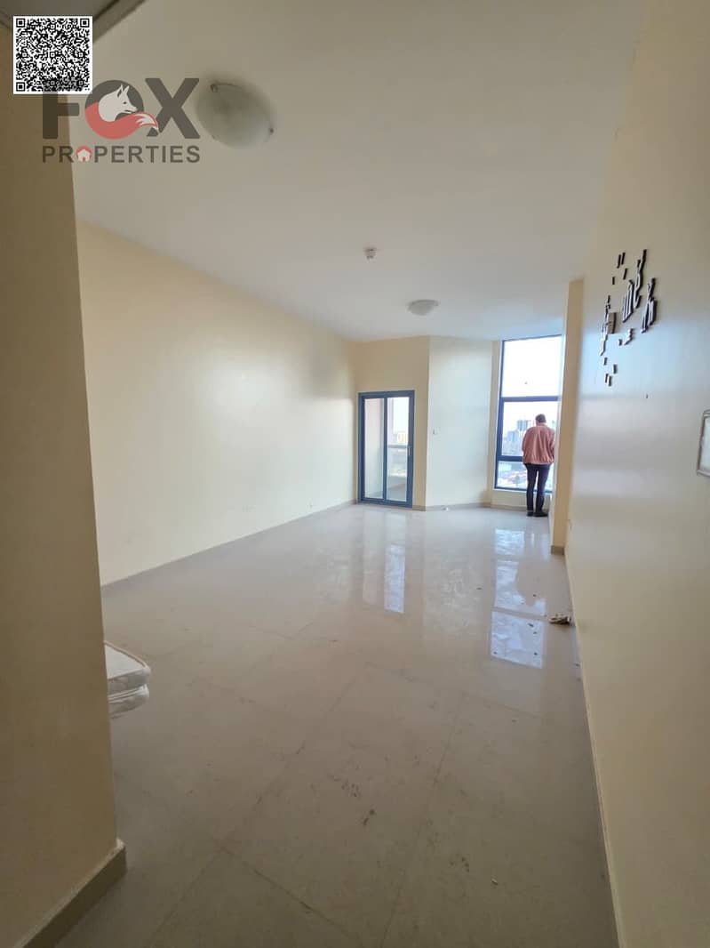Own a two-bedroom apartment with a living room in Al Nuaimi Towers, Tower C, in a very prime location, with a down payment of 210,000 dirhams.