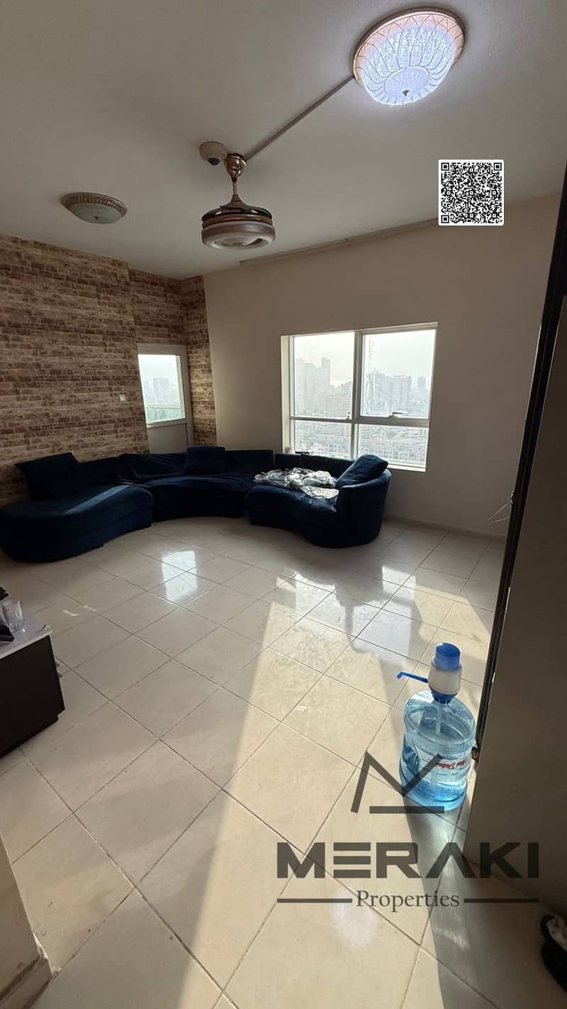 Two-bedroom apartment with a living room, stunning city views, available for immediate occupancy and freehold ownership in the heart of Ajman.