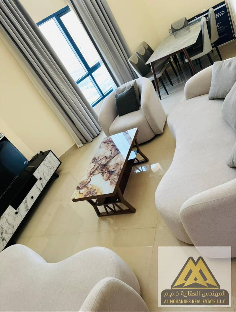 Fully Furnished 2-Bedroom Apartment for Sale in Al Nuaimiyah Towers C Ajman 3 Bathrooms Kitchen 133 Sqm Ready to Move In Total Price AED 210,000