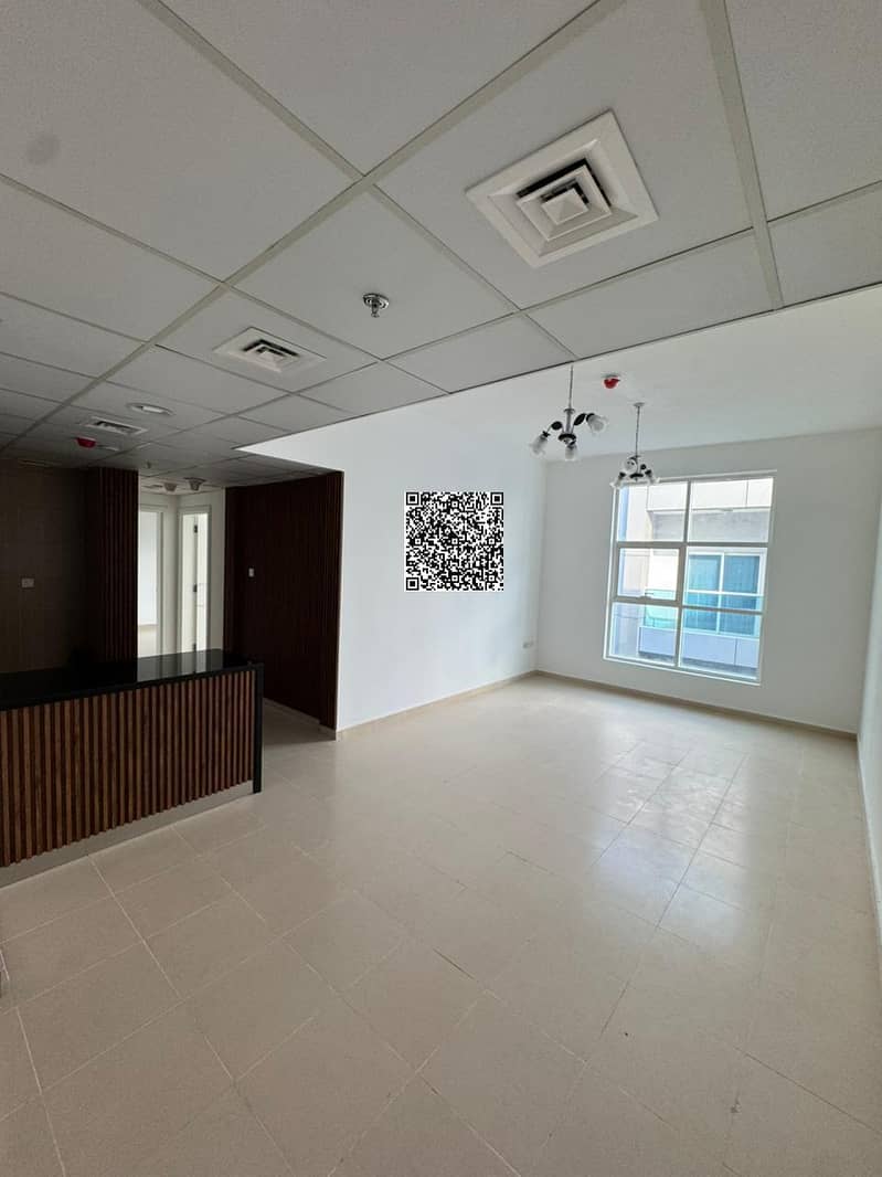 Two-bedroom apartment for sale in Ajman, City Towers. Total asking price: AED 563,307 (including 10% profit). Down payment: AED 338,732.