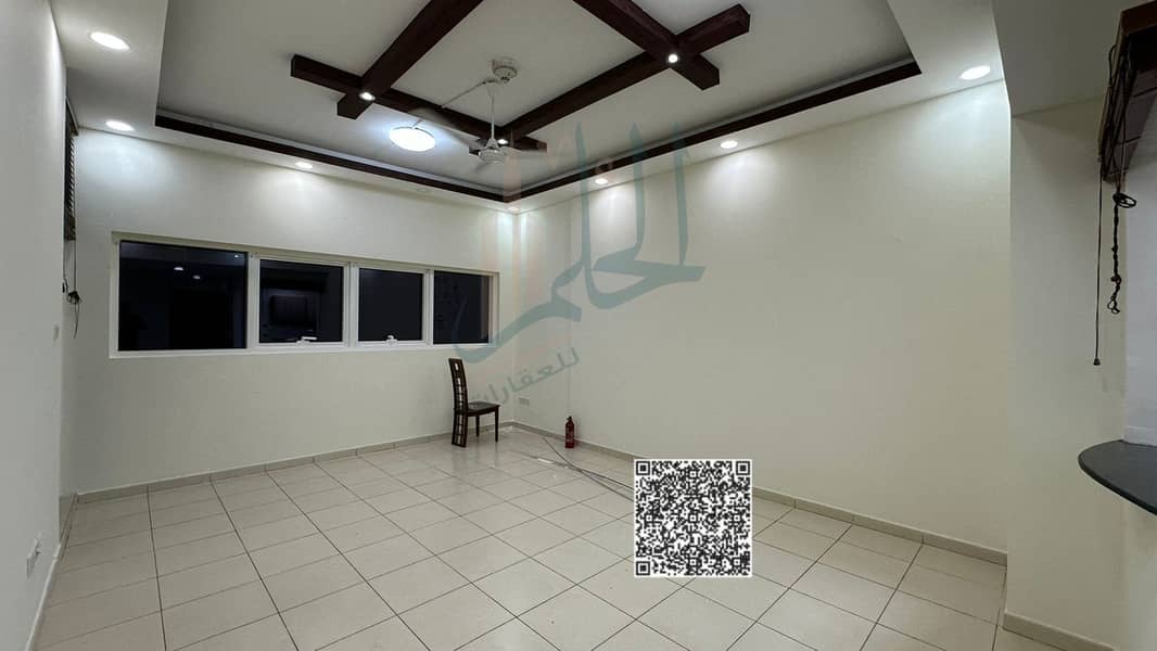 Two-bedroom apartment for resale in Ajman, only for AED 590,000 with installment plan; initial payment AED 260,000