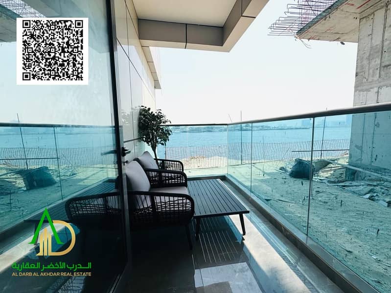 Own an apartment in Ajman Creek Tower 1 with a direct waterfront view of Ajman Creek in a strategic location in Al Rashidiya