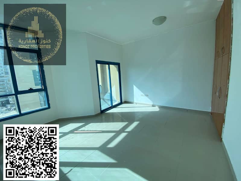 For sale: a one-bedroom apartment with a living room in Al Khor Towers, Ajman, featuring two bathrooms and a balcony. It boasts a prime location near